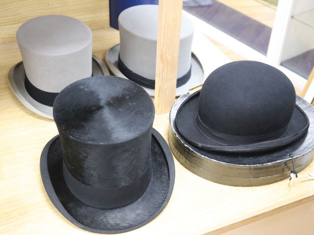 Five mens hats, including a bowler by Lock & Co, a folding top hat by Tress & Co (boxed) and three other top hats,